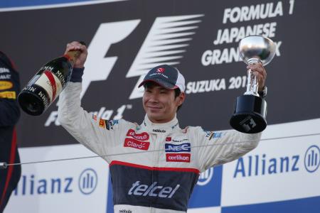 日本GPの表彰台で笑顔を見せる小林可夢偉 Sauber